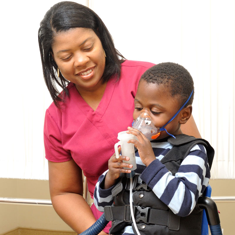 Group Home Nurse and Child