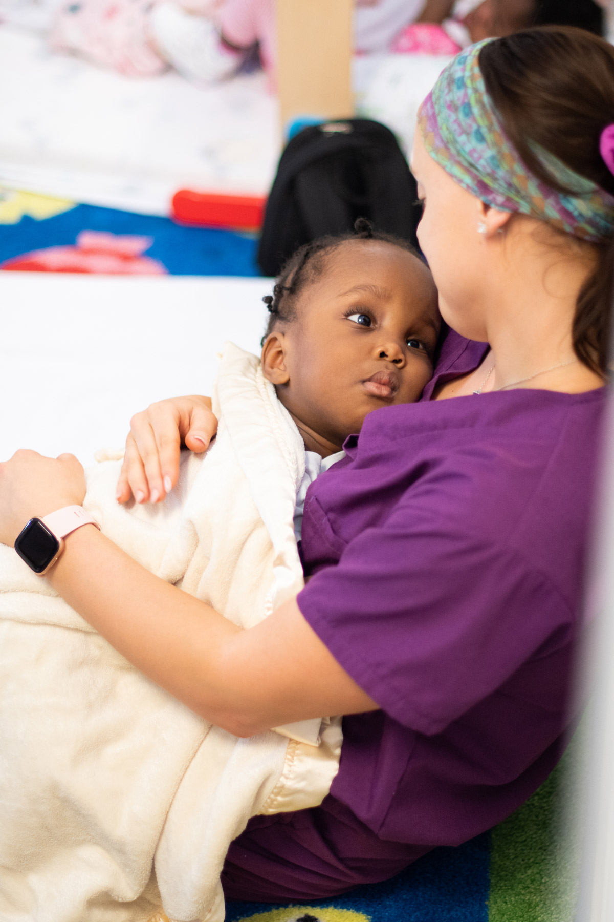 Pediatric Therapist Comforting Child